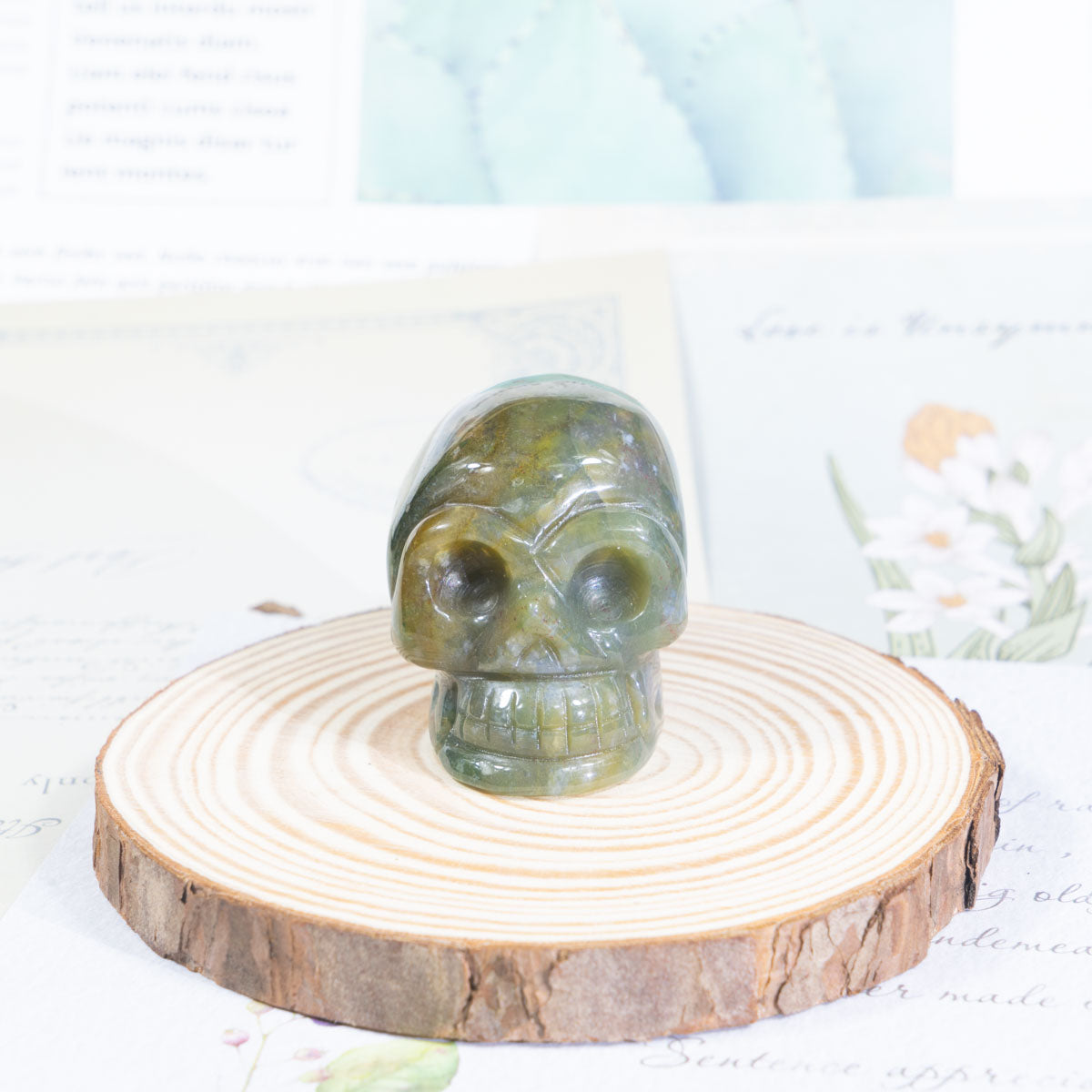 2-Inch Moss Agate Skull In Bulk