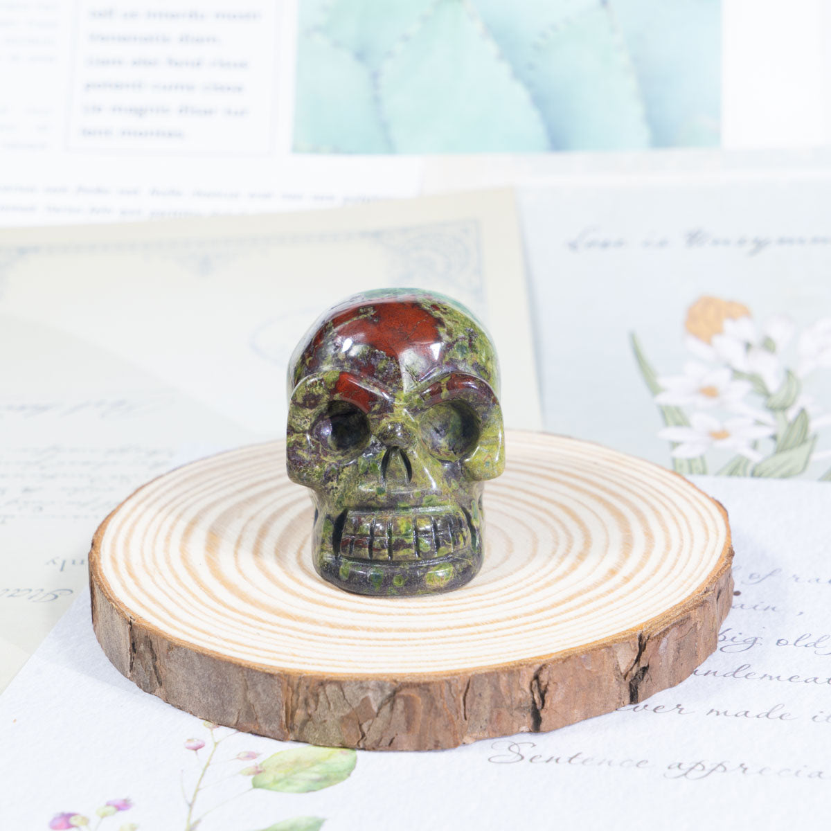 2-Inch Dragon Blood Stone Skull In Bulk